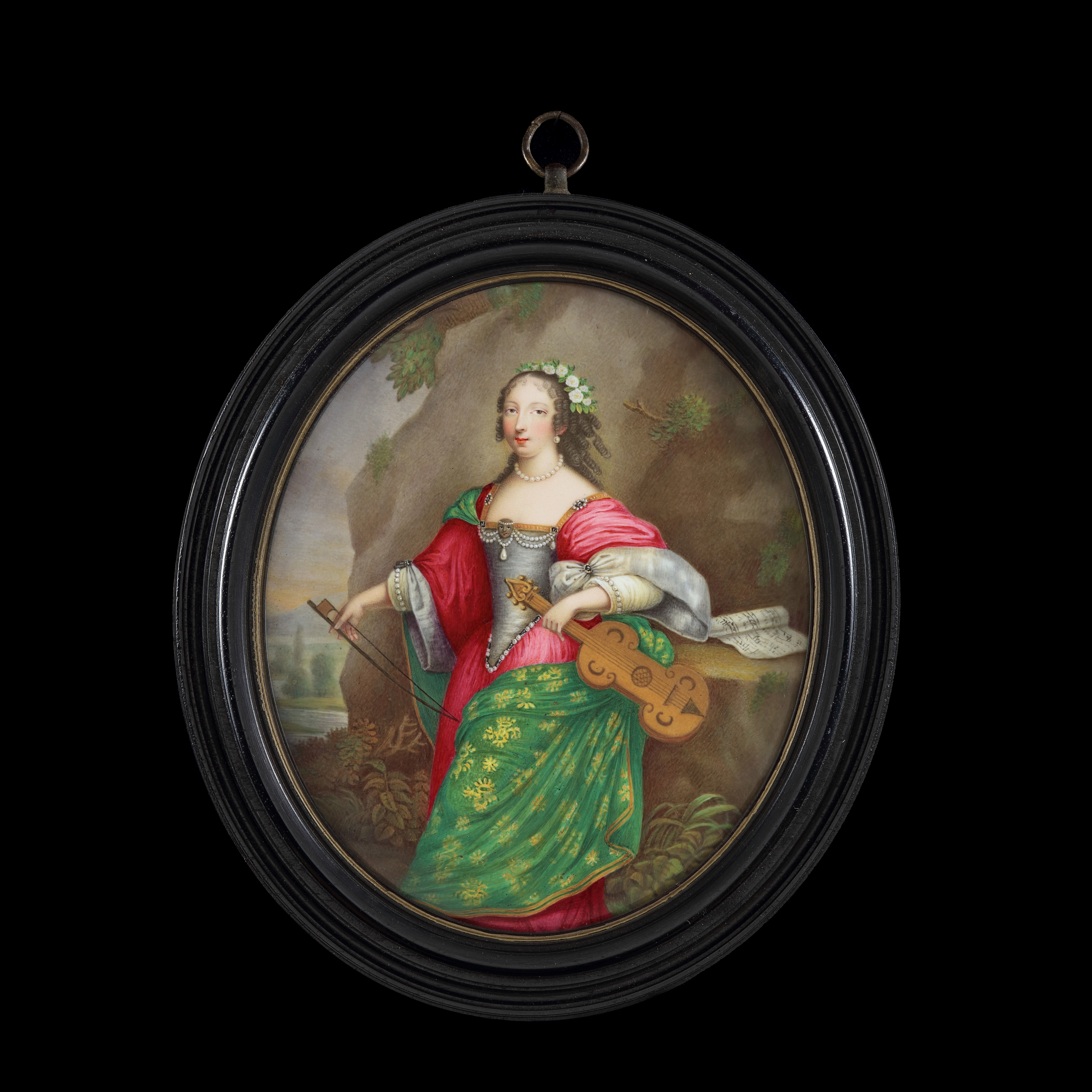 An enamel plaque of a Lady, dressed as a Muse, possibly as a follower of Apollo, in red gown with green embroidered cloak and holding a Lira da braccio ; rock and landscape background